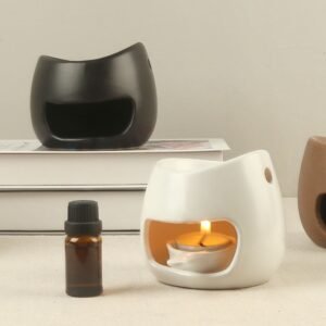 Sleek ceramic aroma diffuser in classic black and white color combination for home decor