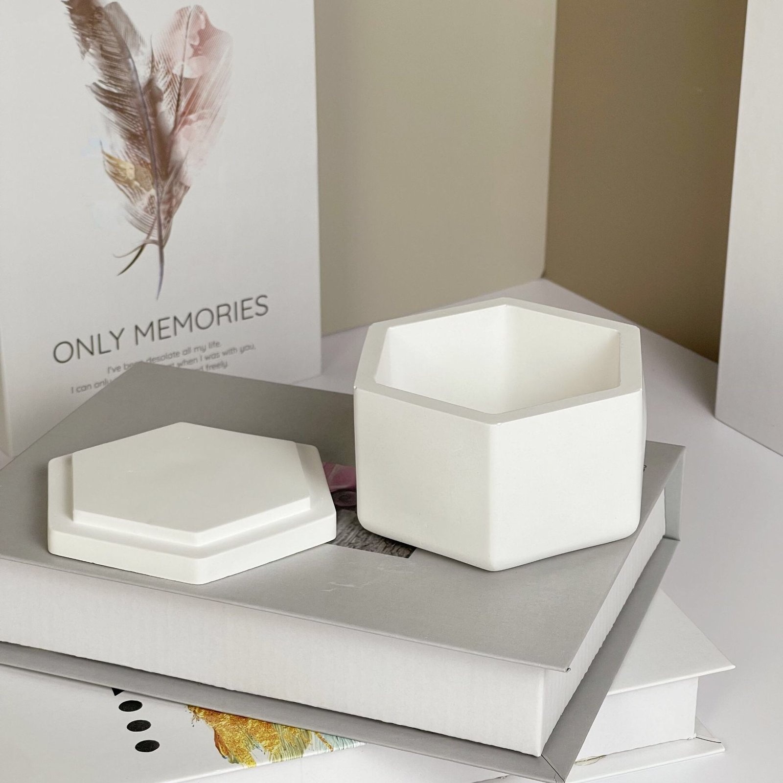 Modern geometric plaster candle jar from multiple viewing angles