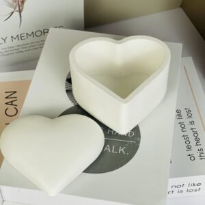 Elegant white heart candle jar with lid in romantic home decor setting