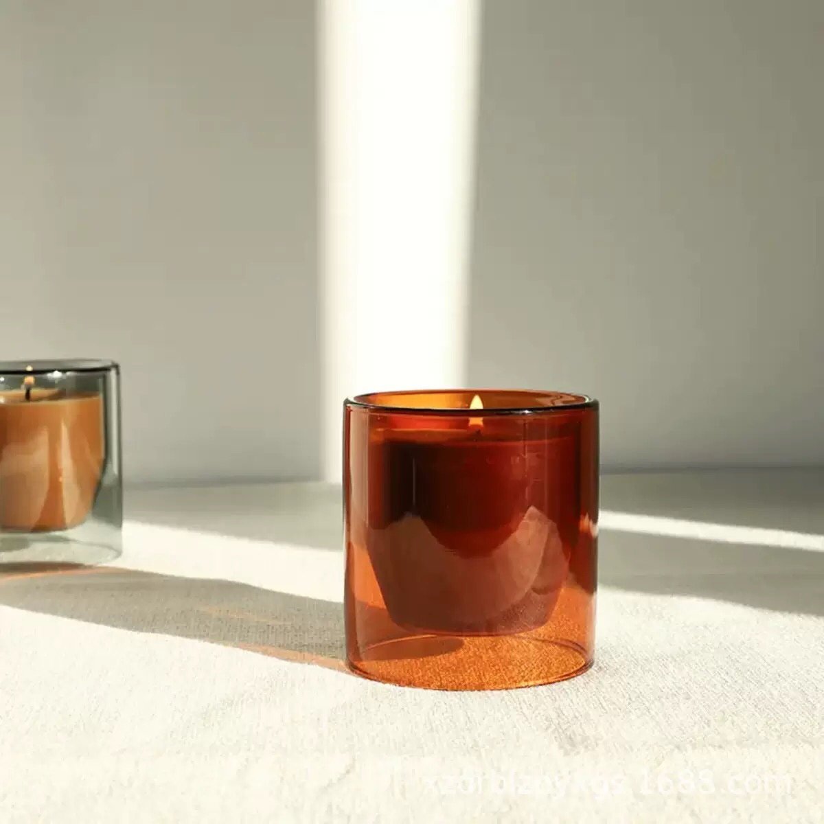 Vibrant red double wall borosilicate glass candle holder showcasing elegant transparency and 200ml optimal capacity.
