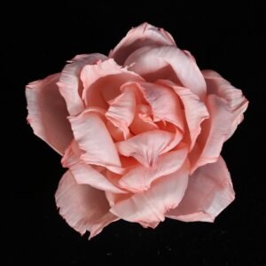 Side profile view of pink artificial rose demonstrating gentle color gradient