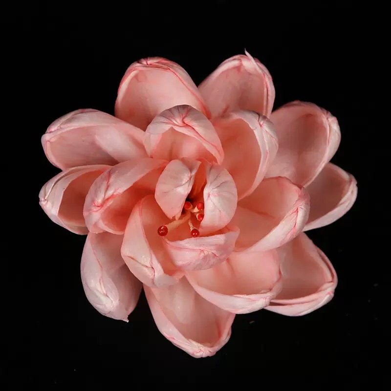 Pink reed diffuser lotus flower close-up featuring delicate craftsmanship and ready-to-use design