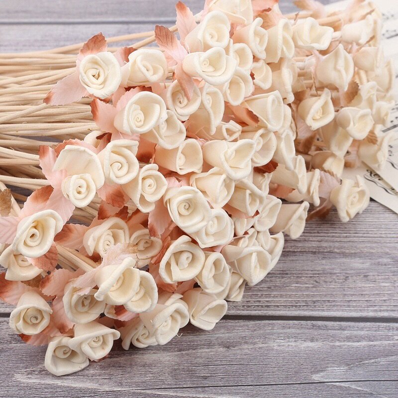 Side view of 3cm artificial rose dried flower, displaying full dimension and ready-to-use vine tail for floral crafts.