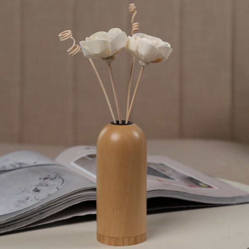 Macro detail of 6cm white semi-blown Tong Cao rose showing layered petals and multiple attachment options