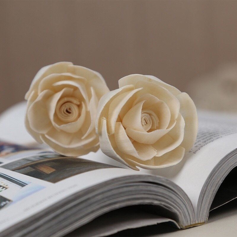 Overhead shot of 6cm paper rose displaying circular symmetry and delicate petal arrangement