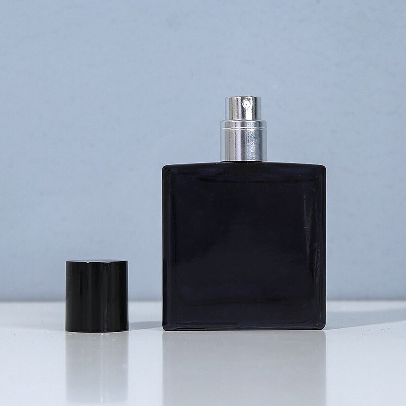 Close-Up of Matte Finish on Black Glass Bottle - Premium Texture for Perfume Packaging