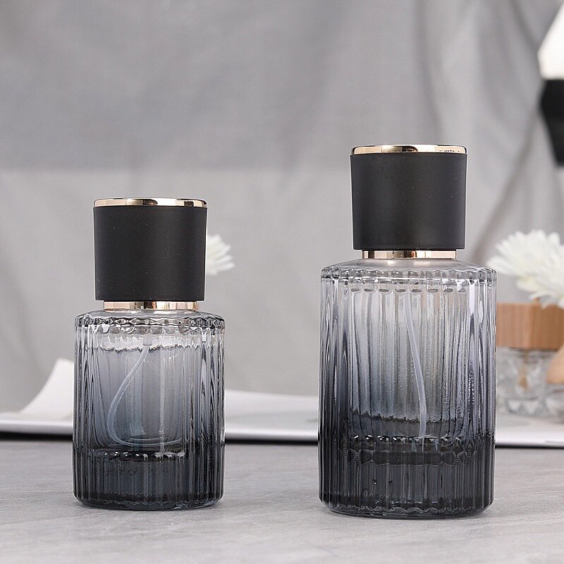 Textured Ribbed Surface on Black Perfume Bottle - Modern Tactile Finish