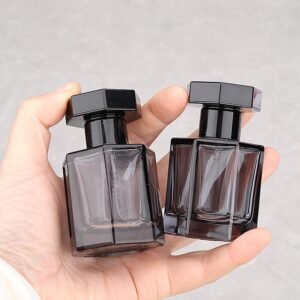 Elegant Transparent Black Perfume Bottle with Gold Accents - Modern Luxury Packaging