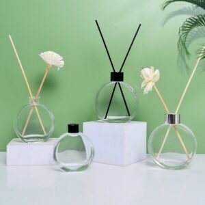 A collection of these bottles in various sizes and lid colors, styled on a minimalist shelf with other beauty objects.