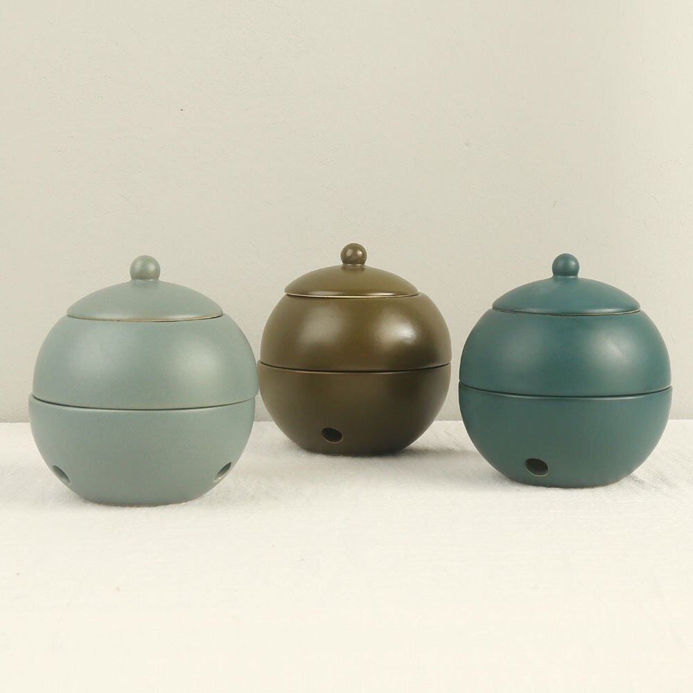 Ceramic oil burner color collection – 12 shades including neutrals, earth tones, and vintage colors.
