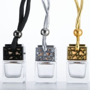 Metal hollow car perfume pendants in black, gold, and silver – front view, elegant design