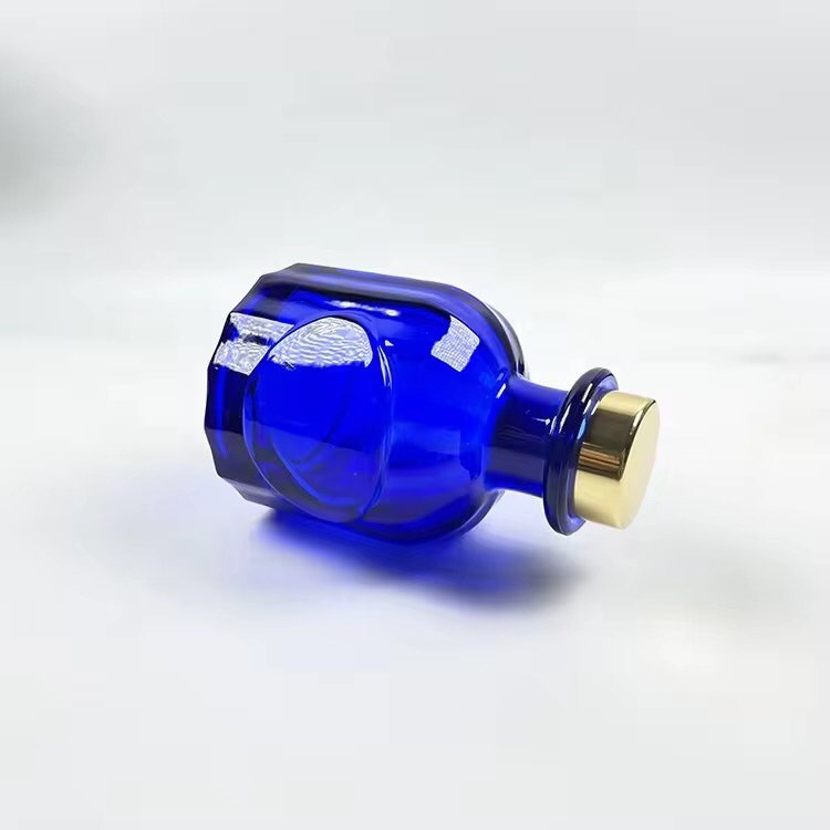 Custom clear blue 50ml aromatherapy bottle from another angle – smooth surface, even color coating