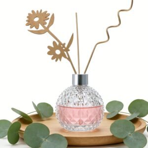100ml diamond round ball aromatherapy bottle with rattan sticks and dried flowers on a wooden table – home fragrance use case