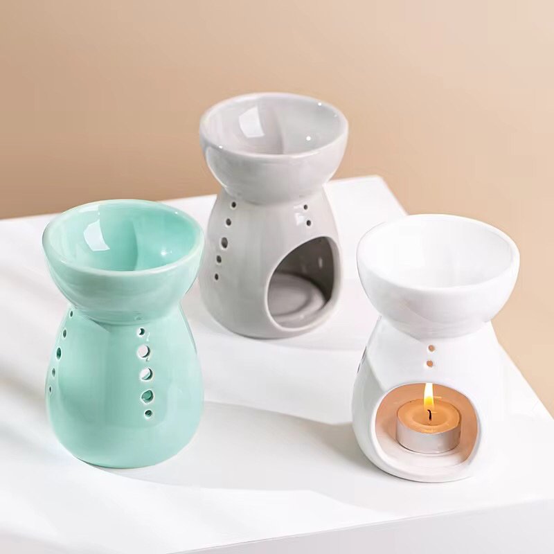 Three vintage wax melt burners in green, gray, and white – side by side color comparison, same size and design
