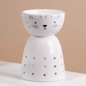 White cat ceramic wax burner – close‑up of facial features, smooth glaze, clean white color