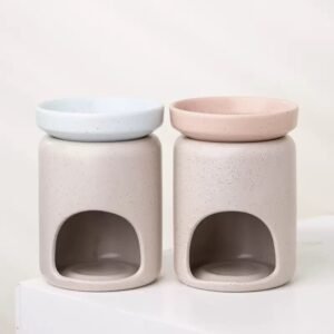 Full front view of both burners – pink dish and white dish, symmetrical cutout design